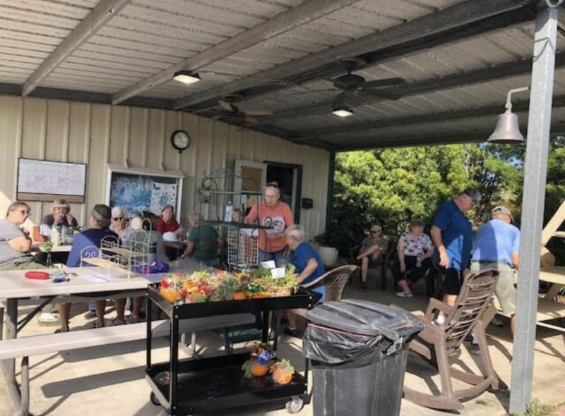 Victoria County Master Gardeners setting up General Store October Plant Sale